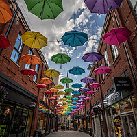 Buy canvas prints of Umbrella Street by Ray Pritchard
