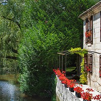 Buy canvas prints of French Riverside Cottage by Jacqui Farrell