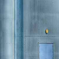 Buy canvas prints of Blue Industrial Building  by Jacqui Farrell