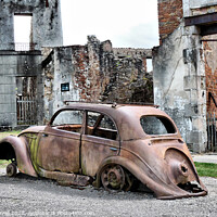 Buy canvas prints of Rusted Car amongst Oradour Ruins  by Jacqui Farrell
