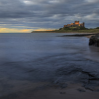 Buy canvas prints of Bamburgh castle    by chris smith