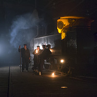 Buy canvas prints of Group of railway workers around steam locomotive a by Philip Enticknap