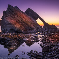 Buy canvas prints of Bow Fiddle Rock at Dawn by Peter O'Reilly