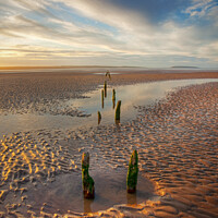 Buy canvas prints of Jetty Remains, Penmaenmawr Beach by Peter O'Reilly