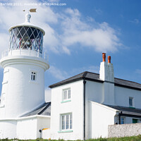 Buy canvas prints of Caldey Island lighthouse, Tenby, Pembrokeshire, UK by Andrew Bartlett