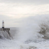 Buy canvas prints of Large waves crash near Porthcawl lighthouse by Andrew Bartlett