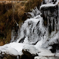 Buy canvas prints of Frozen waterfall at Brecon Beacons, South Wales, UK by Andrew Bartlett