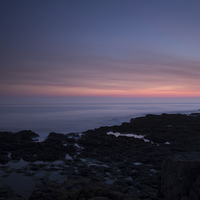 Buy canvas prints of Porthcawl, South Wales, UK, at sunset.  by Andrew Bartlett
