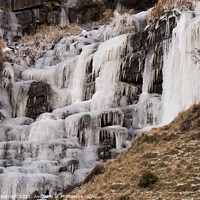 Buy canvas prints of Frozen waterfall at Brecon Beacons, South Wales by Andrew Bartlett