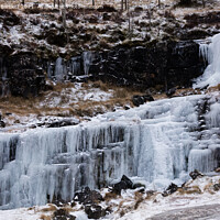 Buy canvas prints of Frozen waterfall at the Brecon Beacons, South Wales, UK. by Andrew Bartlett