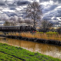 Buy canvas prints of Steam train in cloudy conditions  by Framemeplease UK