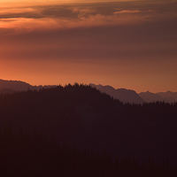 Buy canvas prints of Setting Sun Over Coast Mountain Range by Stephen Suddes