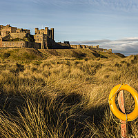 Buy canvas prints of Bamburgh Castle by Reg K Atkinson