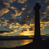 Buy canvas prints of Lindisfarne Memorial Cross At Sunset by Reg K Atkinson