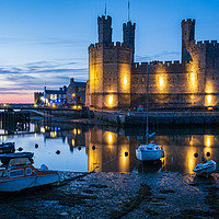 Buy canvas prints of Caernarfon Castle Sunset by Lee Sutton