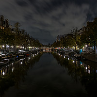 Buy canvas prints of Amsterdam central canal at night  by Steven Blanchard