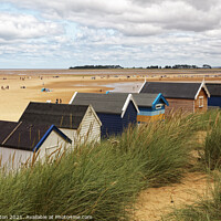 Buy canvas prints of Wells next the sea beach huts by Ian Merton