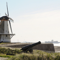 Buy canvas prints of   Windmill and canons in Holland by Jurgen Schnabel