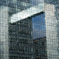 Buy canvas prints of  Office building reflection by Jurgen Schnabel