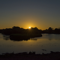 Buy canvas prints of  Sun Setting over Lackford Lake by Nick Rowland