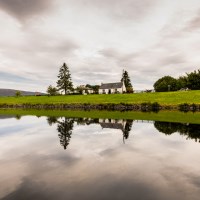 Buy canvas prints of Reflections on the Caledonian Canal at Gairlochy by Nick Rowland
