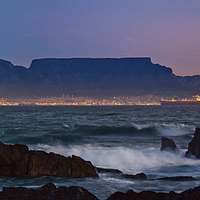 Buy canvas prints of Table Mountain from Bloubergstrand Night by John Hickey-Fry