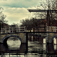 Buy canvas prints of Bruges canal bridge by Lawson Jones