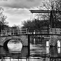 Buy canvas prints of Bruges Old Town Canal bridge by Lawson Jones