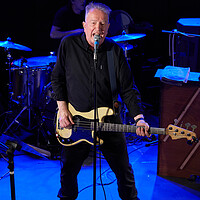 Buy canvas prints of Tom Robinson in concert by Richard Downs