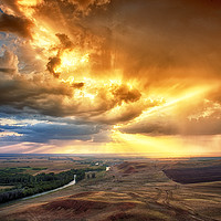 Buy canvas prints of Rolling Rain of Summer Sunset by John Williams