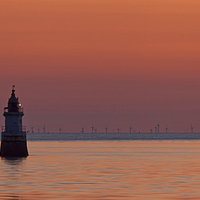 Buy canvas prints of Mystical Sunset at Plover Scar Lighthouse by MICHAEL YATES