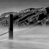 Buy canvas prints of Coastal Rocks and Fence Post by Pete Watson