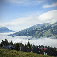 Buy canvas prints of Switzerland Mountains with low cloud by Darren Willmin
