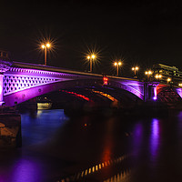 Buy canvas prints of Blackfriars Bridge Illuminated in Purple by Paul Warburton