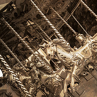 Buy canvas prints of Sepia Carousel Horse by Paul Warburton