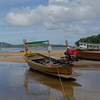 Buy canvas prints of Longtail Boat at Low Tide #1 by Annette Johnson