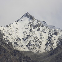 Buy canvas prints of Kongur Tagh- Highest peak in Tian Shan Mountains by Annette Johnson