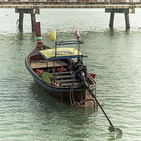 Buy canvas prints of Long tail boat  at Chalong Pier by Annette Johnson