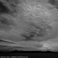 Buy canvas prints of Clouds in Mono by Annette Johnson