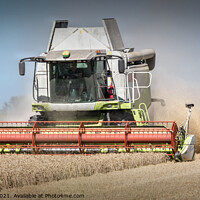 Buy canvas prints of Mighty Machine Harvesting Barley by Jeremy Sage