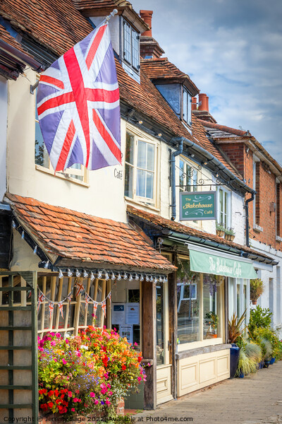 Patriotic Union Flag Flying Above a Beautiful Flor Picture Board by Jeremy Sage