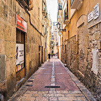 Buy canvas prints of Peaceful Alleyway in Tarragona by Jeremy Sage