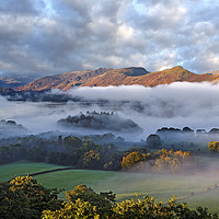 Buy canvas prints of Mists over Derwentwater and Catbells by Martin Lawrence