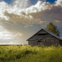 Buy canvas prints of Summer Clouds Over The Barn and Fields by Jukka Heinovirta