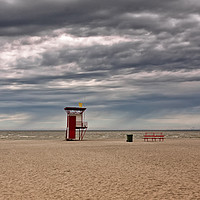 Buy canvas prints of Rain Clouds Over The Beach by Jukka Heinovirta