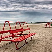 Buy canvas prints of Red Bench On A Beach by Jukka Heinovirta