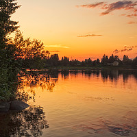 Buy canvas prints of Sunset By The River Kemijoki by Jukka Heinovirta