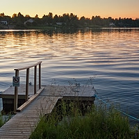 Buy canvas prints of Pier In The Sunset by Jukka Heinovirta