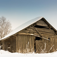 Buy canvas prints of Snow Covered Barn House by Jukka Heinovirta