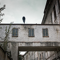 Buy canvas prints of Lamp At The Prison Roof by Jukka Heinovirta